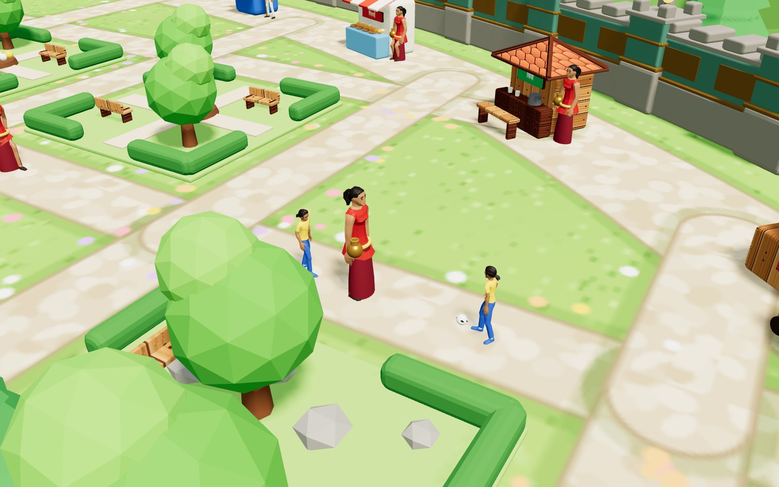 Two kids passing a football in a cobbled lane beside a park.